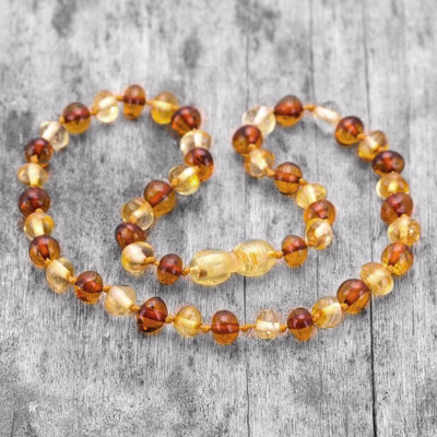 Lantisor copii cu margele din chihlimbar maro si galben