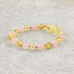 Brățară pentru bebelusi din chihlimbar galben si cuarț roz