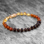 Brățară chihlimbar baltic cu margele semirotunde model ~ curcubeu