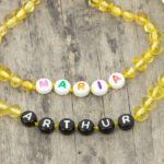 Colier chihlimbar copii cu nume SOMN PROFUND ~ culoare lămâie