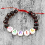 Brățară chihlimbar copii cu nume și șnur roșu  ~ model cireș - Numele lui Povestea lui