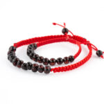 Set Brățări Copil & Adult din Chihlimbar Baltic Negru & Șnur Roșu Împletit – Protecție Tradițională cu un Look Deosebit