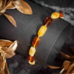 Bratara chihlimbar, pietre ovala, culoare coniac unt