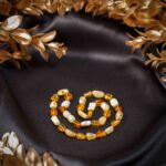 Colier chihlimbar bebe/copii IMUNITARE & EMOTII, culoare unt-miere, pietre ovale, CCC032