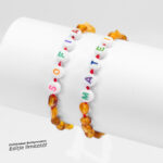 Brățară de chihlimbar pentru nou nascut, personalizată cu nume și șnur roșu