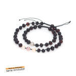 imagine de produs pe fundal alb cu doua bratari adult copil editie limitata din chihlimbar negru si perle