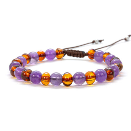 Brățară elastică din chihlimbar și ametist, realizată manual pentru echilibru energetic și protecție. bratara-chihlimbar-1197.jpg – Brățară din chihlimbar baltic natural și ametist, cu șnur ajustabil și bile metalice la capete. Dacă dorești ajustări pentru optimizarea SEO sau pentru a evidenția anumite detalii, spune-mi și le modific! 😊